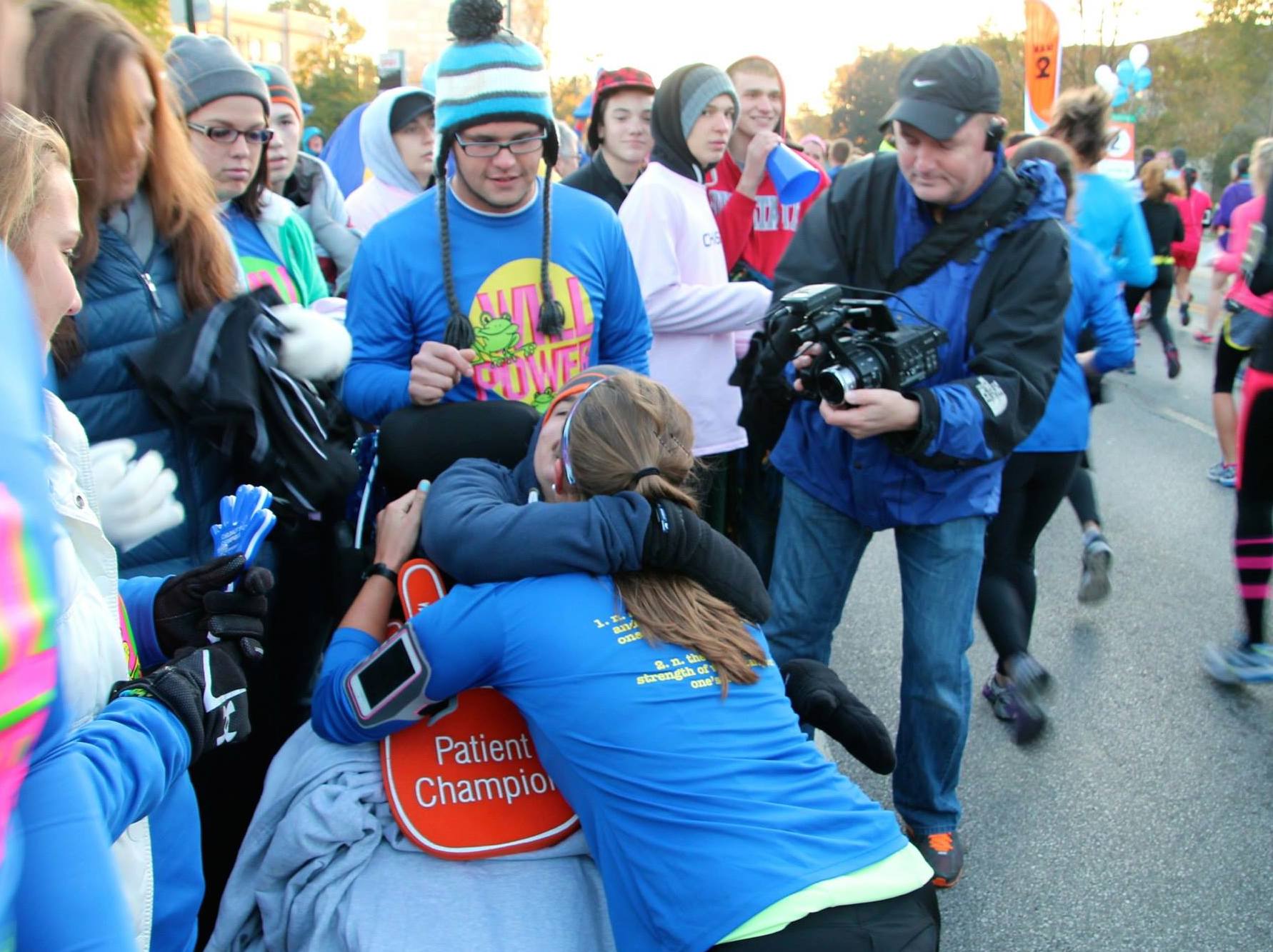 Will, being hugged by his sister, was chosen as one of the 2012 Patient Champions for the Columbus Marathon