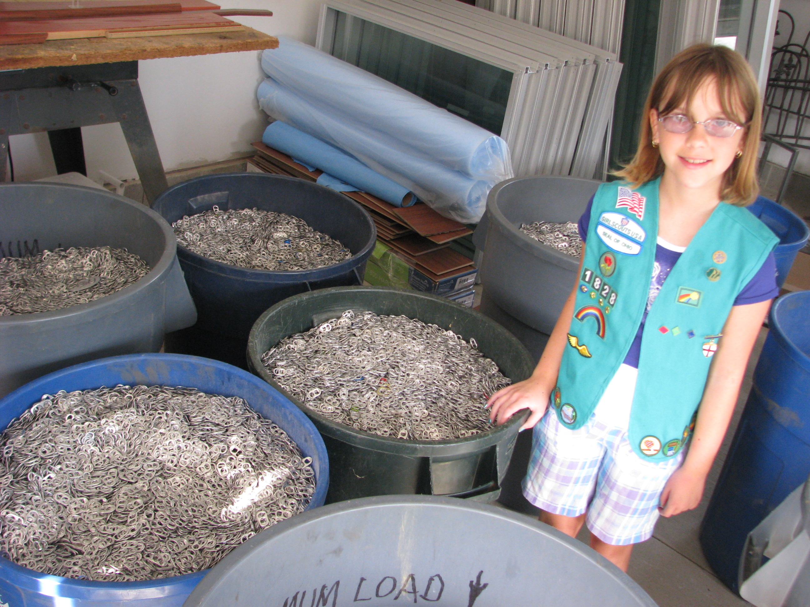 Alli posing with all of her pop tabs!